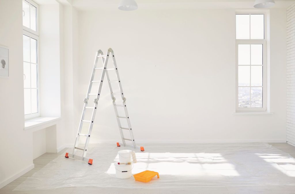 A Grandview Painting team member delivering interior painting in Dubuque, IA, demonstrating the benefits of using a local professional for this essential service.