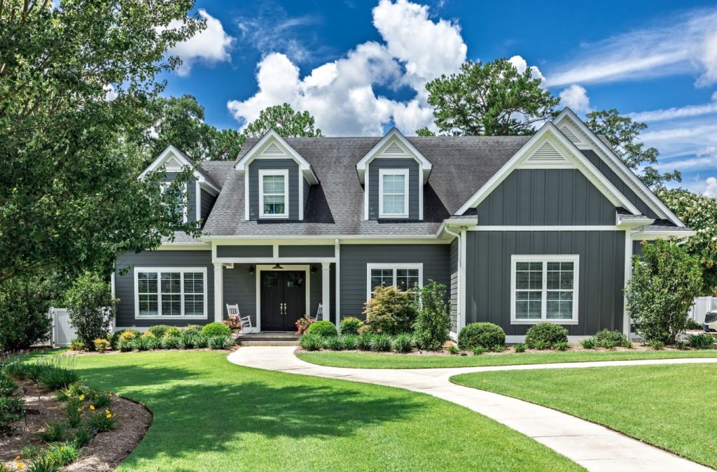A Grandview Painting expert providing painting company services in East Dubuque, IL, showing why clients trust our work quality and service. Painting Company near me.