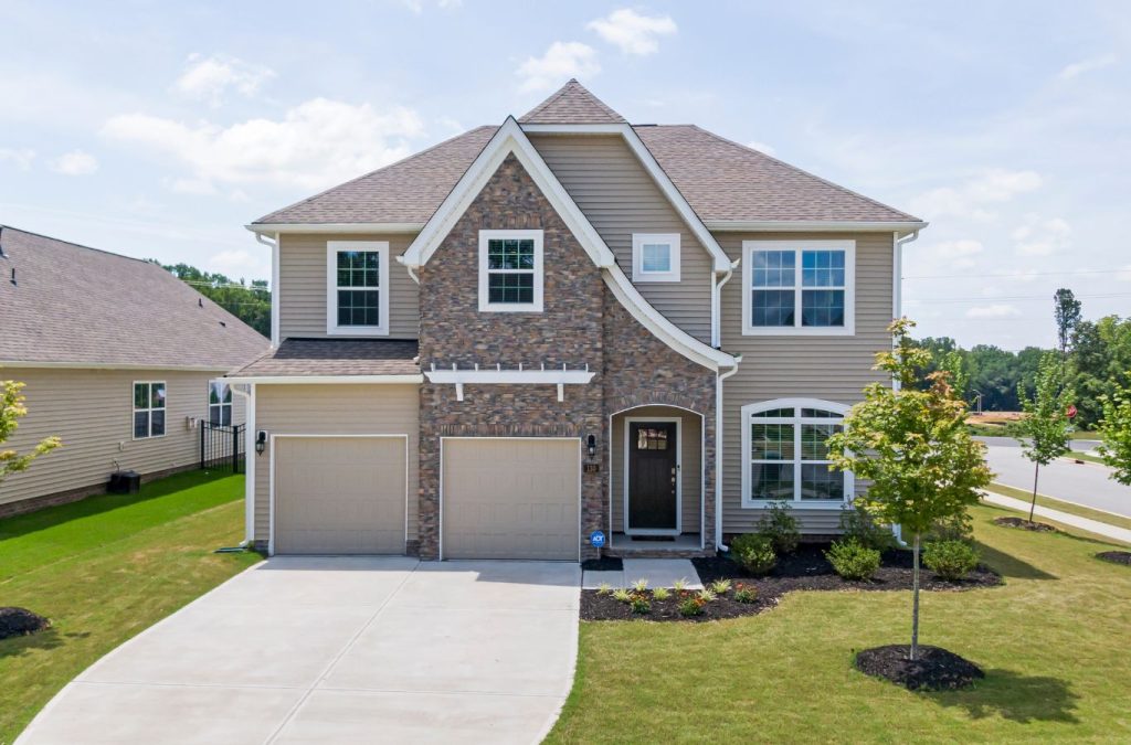 A Grandview Painting professional expertly providing exterior painting services in Platteville, WI, using top-quality tools to achieve exceptional results.